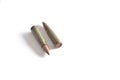 Two rifle bullets isolated on a white background. Military ammunition Royalty Free Stock Photo