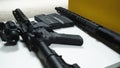 Two rifles with colimator laying on the table in shooting range Royalty Free Stock Photo