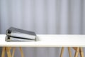 Two ring binders lying on a simple white desk on wooden racks, grey background with copy space, office or business concept Royalty Free Stock Photo