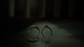 Wedding rings on a floor with smoke Royalty Free Stock Photo