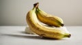 Two ripe bananas on a white, isolated.