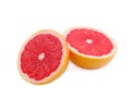 Two Ripe half of pink grapefruit citrus fruit on white background. Royalty Free Stock Photo