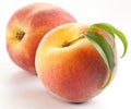 Two ripe peach with leaves Royalty Free Stock Photo