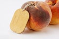 two ripe peach with tag Royalty Free Stock Photo