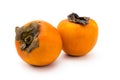 Two ripe persimmon close up