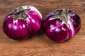 Two eggplants Helios on the wooden rustic table Royalty Free Stock Photo