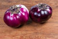 Two eggplants Helios on the wooden rustic table Royalty Free Stock Photo