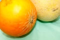 Two ripe yellow melons of different varieties Royalty Free Stock Photo