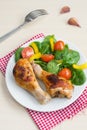 Two roasted chicken legs with salad Royalty Free Stock Photo