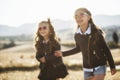 Two rock girls in a sunset light Royalty Free Stock Photo