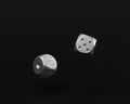 Two Rolling Silver Casino Dice on Black Background showing five and one Royalty Free Stock Photo