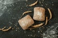 Two rolls of ciabatta on a black background . Top view, flat lay Royalty Free Stock Photo