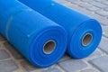 Two rolls of mesh,The grid for building in a roll is for walls on the house Royalty Free Stock Photo