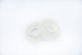 Two rolls of transparent tape on a white background. Adhesive tape. New scotch tape Royalty Free Stock Photo