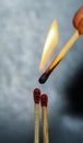 Two Romantic Matchsticks burning In Love. Love And Romance Concept. Matchstick art photography used matchsticks. Royalty Free Stock Photo