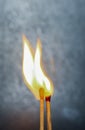 Two Romantic Matchsticks burning In Love. Love And Romance Concept. Matchstick art photography used matchsticks. Royalty Free Stock Photo