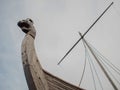 Two rooks of ancient Vikings with decor on the bow, wooden ships, Museum exhibit