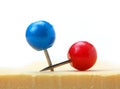 Two round push pins Royalty Free Stock Photo