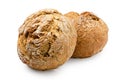 Two round rustic whole wheat bread rolls isolated on white Royalty Free Stock Photo