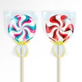 Two round striped lollipops packed in transparent cellophane bags or packs with a decorative yellow ribbons. Realistic