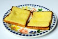 Two rounds of cheese on toast. Royalty Free Stock Photo