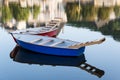 Two rowing boats moored on the river Royalty Free Stock Photo