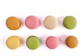 Two rows of colorful French macarons.