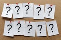 Two rows of question marks pinned to a board Royalty Free Stock Photo