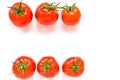 Two rows of ripe red tomatoes on white isolated Royalty Free Stock Photo