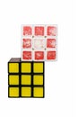 Two rubik`s cube, old and new rubik`s cube isolated on white background. Royalty Free Stock Photo