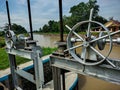 Rudder used to open and close irrigation water gates