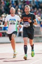 Two runners on the final stretch at Stockholm Stadion
