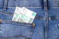 Two Russian banknotes in jeans pocket