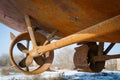 Two rusty screws in the nozzle belonging to the ship, which stands in a dry dock in winter