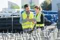 two safety specialists monitoring perimeter petrochemical refinary Royalty Free Stock Photo