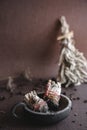 Two sage smudge stick in an iron cast bowl