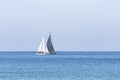 Two sailboats are sailing out to sea Royalty Free Stock Photo