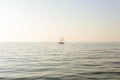 Two sailboats with white sails in the sea. Royalty Free Stock Photo