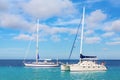 Two sailing boats floating on blue sea Royalty Free Stock Photo