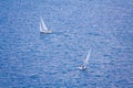 Two sailing ships on the blue water Royalty Free Stock Photo