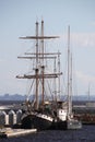 Two sailing ships are moored to each other at the pier Royalty Free Stock Photo