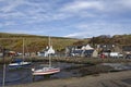 Two Sailing Vessel moored in the silt at low tide in the small harbour of the Fishing Village of Gourdon Royalty Free Stock Photo