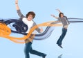 Two of the same young man jumping for joy Royalty Free Stock Photo