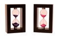 Two sandglass on a white background Royalty Free Stock Photo
