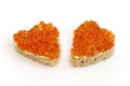 Two sandwich in the form of a heart with red caviar white Royalty Free Stock Photo