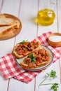 Two sandwiches with eggplant caviar made from baked eggplants, sweet peppers and tomatoes, seasoned with vegetable oil, on a green Royalty Free Stock Photo