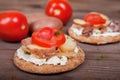 Two sandwiches with herring on the table