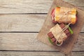 Two sandwiches with salad, ham, cheese and tomatoes Royalty Free Stock Photo