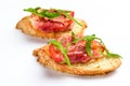 Two sandwiches with serrano ham, cheese and arugula Royalty Free Stock Photo