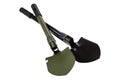 Two sapper shovels on a white background, green and black shovels for camping or for hiking Royalty Free Stock Photo